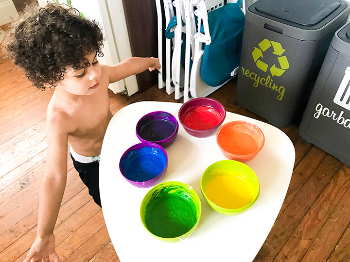 Once the different color are ready, let your toddler make the decision on what order to follow when pouring the batters into the cupcake holders.